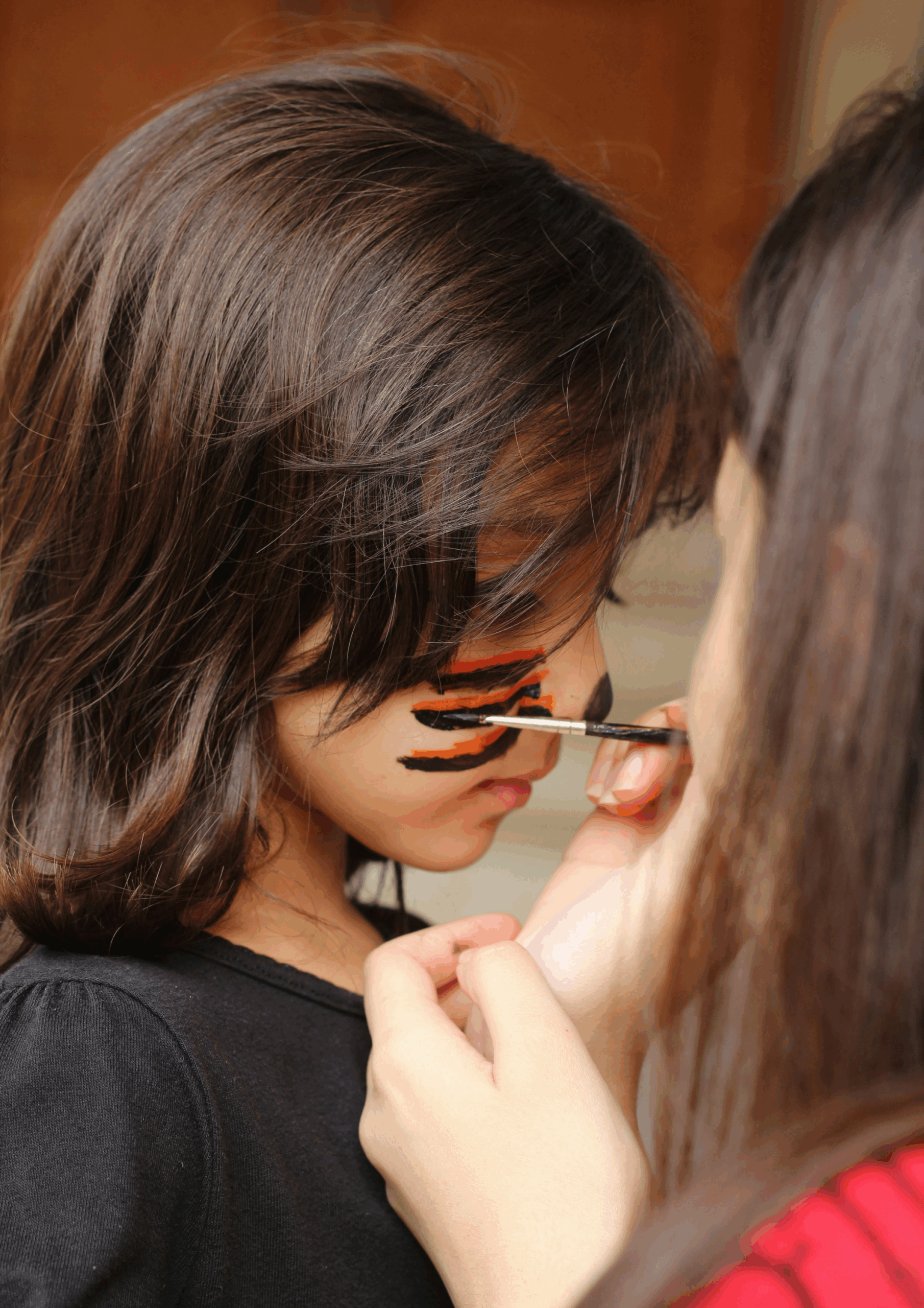 Face painting at the Summer Fayre