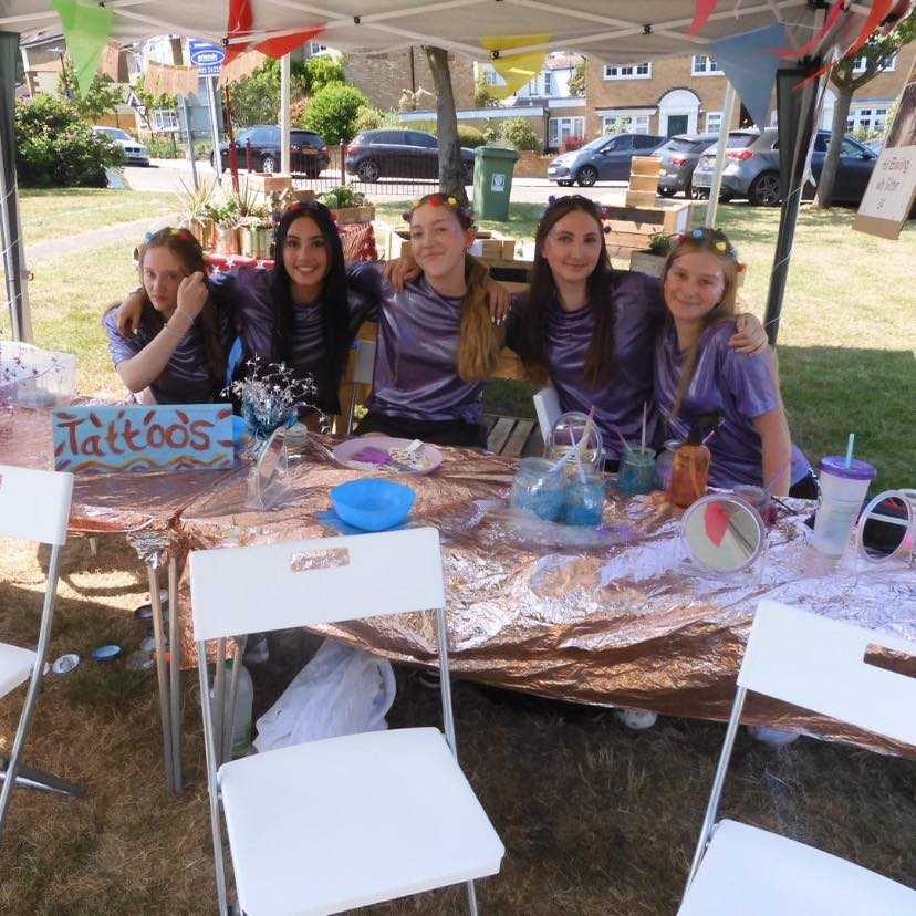 A face paint stall at the Oxhey Village Summer Fayre 2023