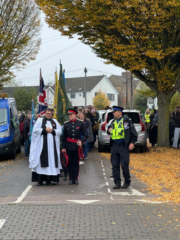 Residents walking through Oxhey Village for the remembrance day parade on 10 November 2024