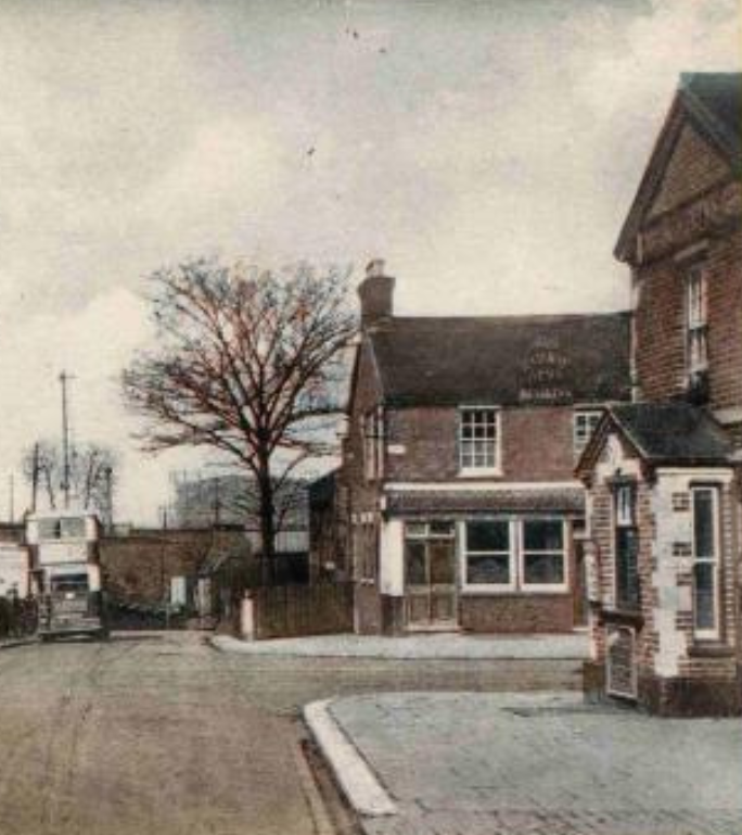 An historical photo of Pinner Road in Oxhey Village showing the Railway Arms and Duke of Edinburgh pubs
