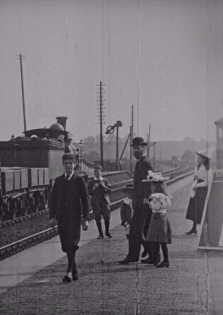 People on the platform at Bushey rail station near Watford in 1897. Still image taken from Charles Goodwin Norton's film; part of the BFI archive