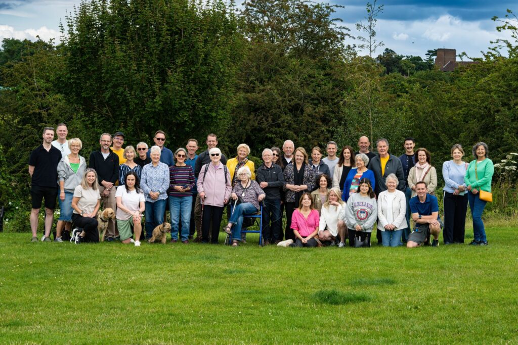 Volunteers and residents on Oxhey Village Green to celebrate OVEG's 50th anniversary on 13 July 2024