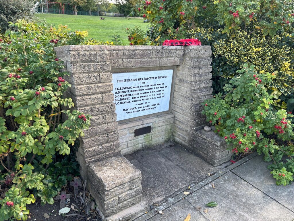 A side view of Oxhey Village War Memorial, on Upper Paddock Road