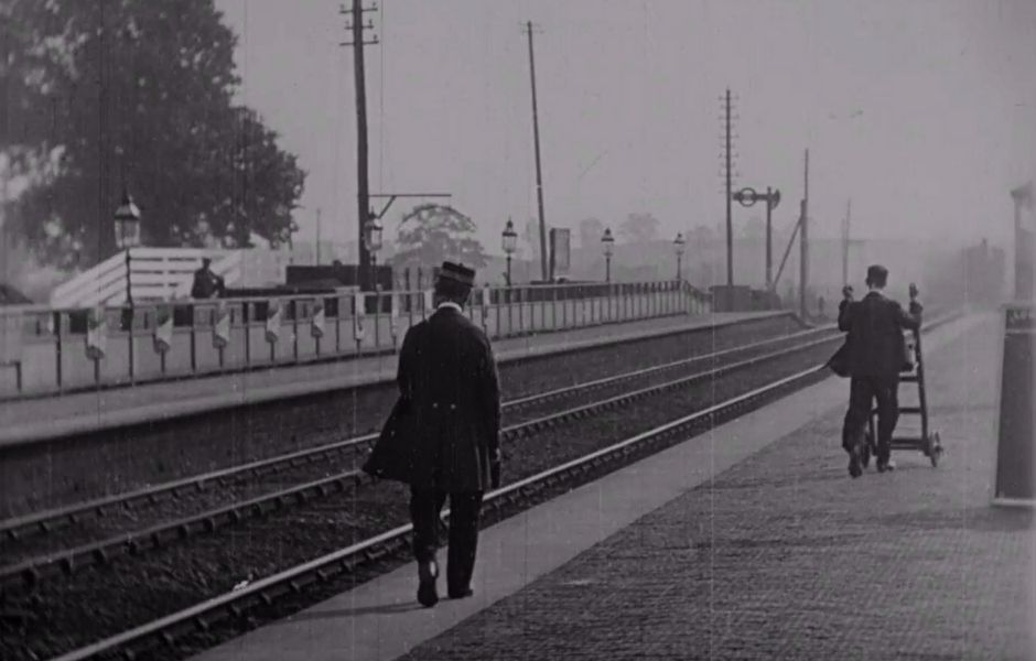 Staff working on the platform at Bushey rail station near Watford in 1897. Still image taken from Charles Goodwin Norton's film; part of the BFI archive