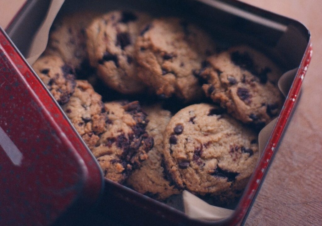 A metal box filled with cookie biscuits