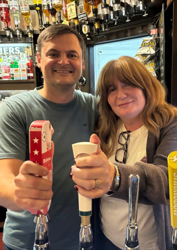 New landlady of the Villiers Arms Oxhey Village Paula Murphy, with former landlord Jason Gutteridge in October 2024