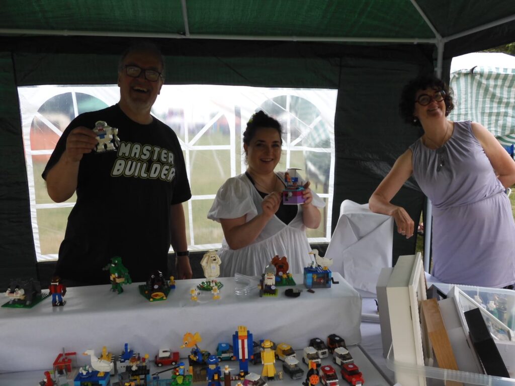 Ian Davis and Cate Codrington with a lego stall at OVEG's Oxhey Village Summer Fayre on Saturday 18 June 2022