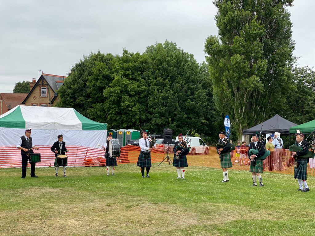 The Glen Trew Pipe Band at OVEG's Oxhey Village Summer Fayre on Saturday 18 June 2022