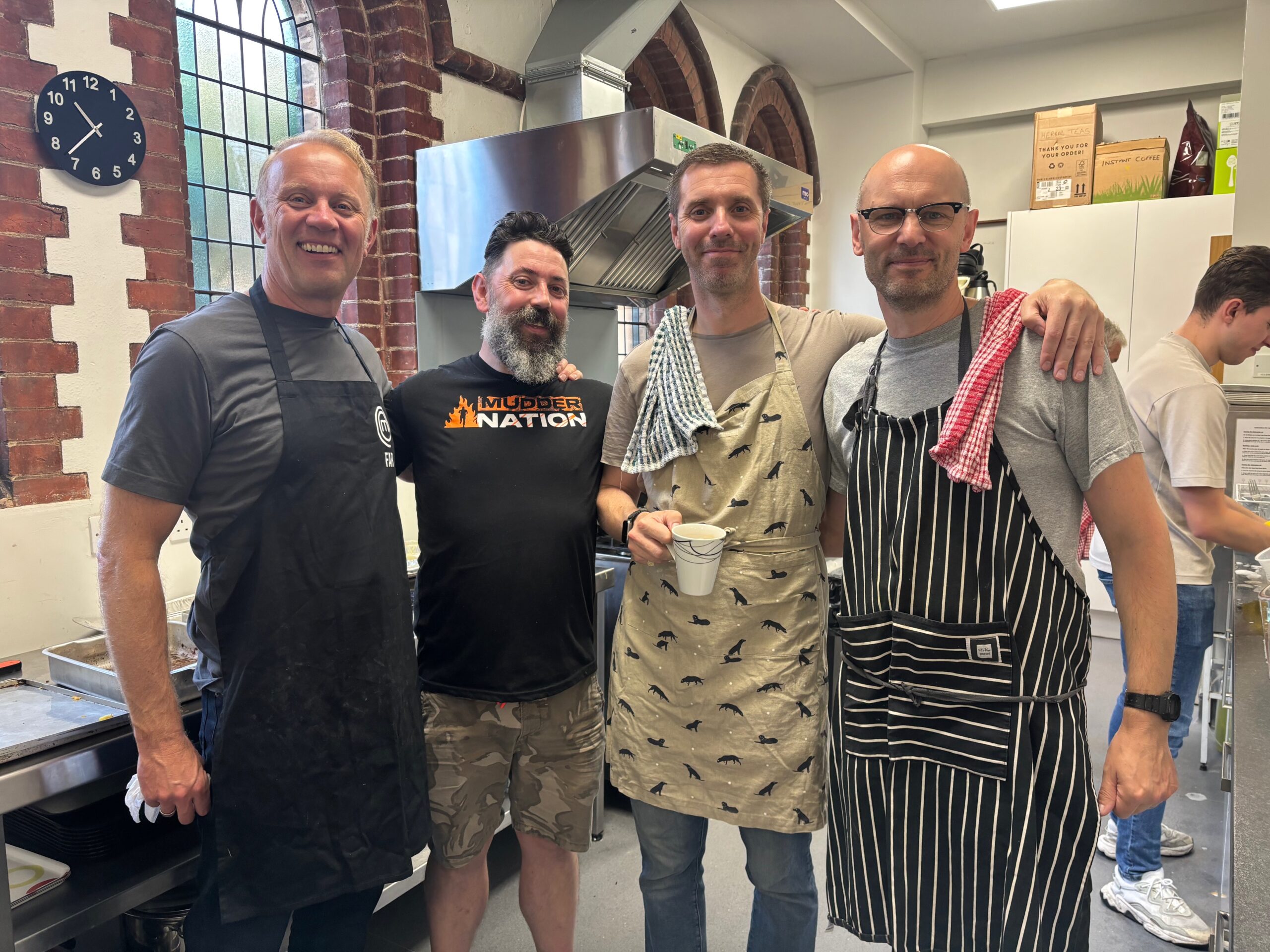 Kitchen staff posing in the kitchen at OVEG's Oxhey Village Big Breakfast on 26 September 2026