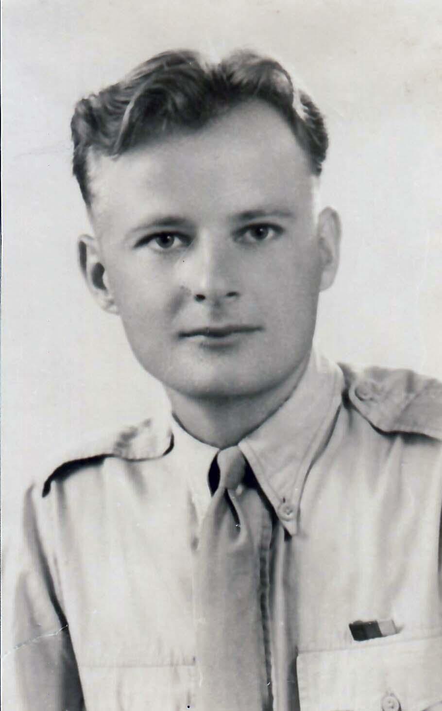 A black and white photo of Ted Parrish from Oxhey Village in military uniform